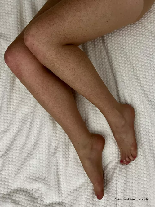 Long legs in black sheer pantyhose