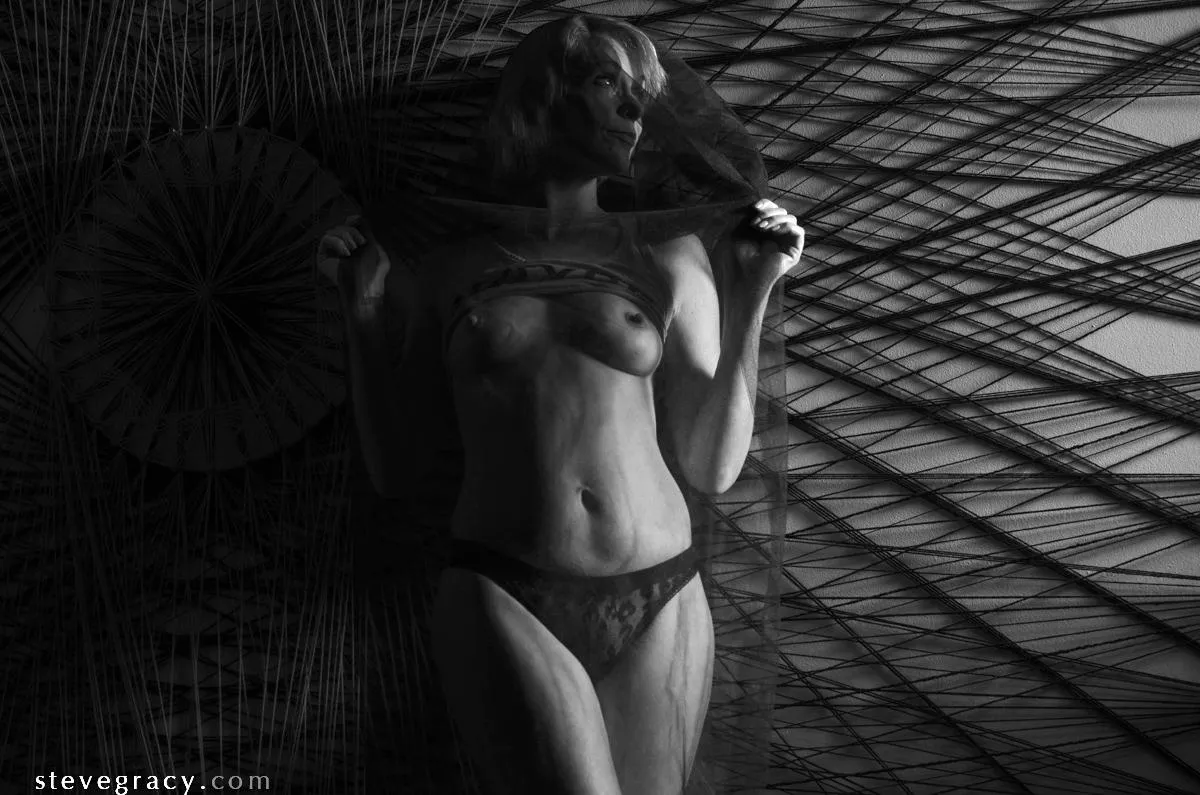 Becca on the string art wall