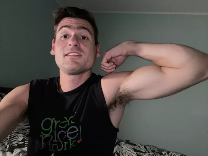 Hot guy flexing showing armpit