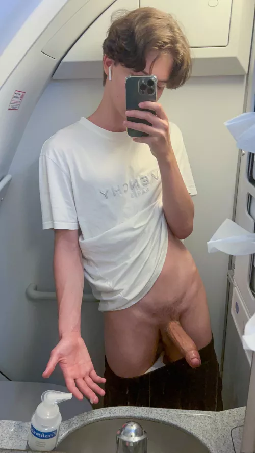 Oops, couldn't take the long ride and had to cum on the plane