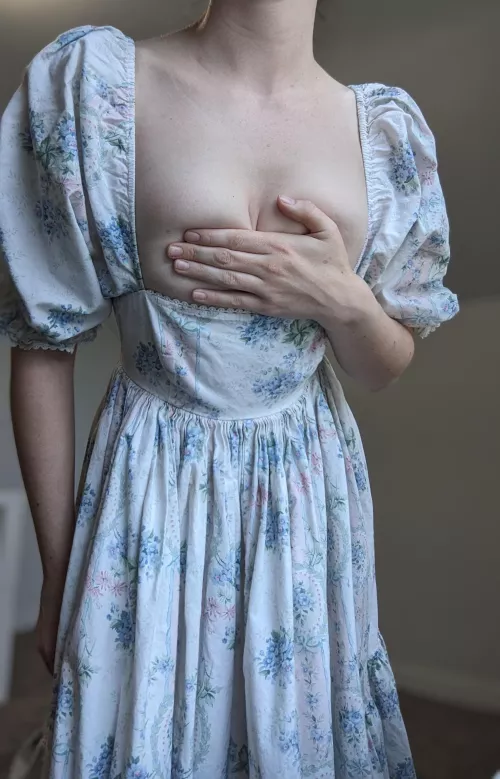 I think the cut on this dress is a little too low [F]