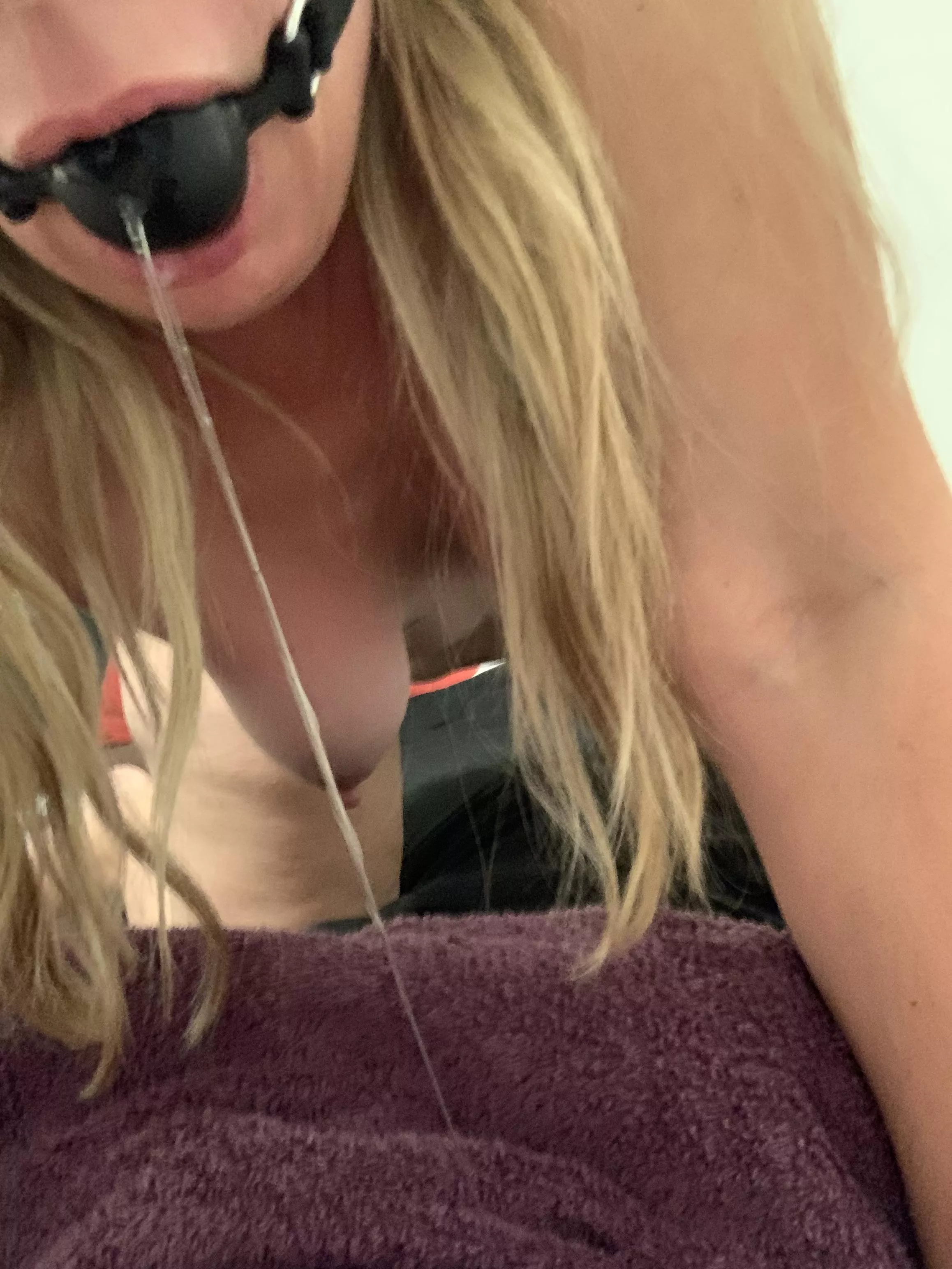 Drooling from the cock gag in my throat, patiently waiting for you and your friends to use my other holes