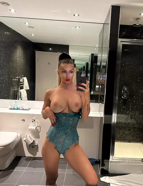 These big tits need a spray down