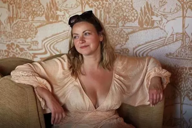 Plunging neckline curvy blonde