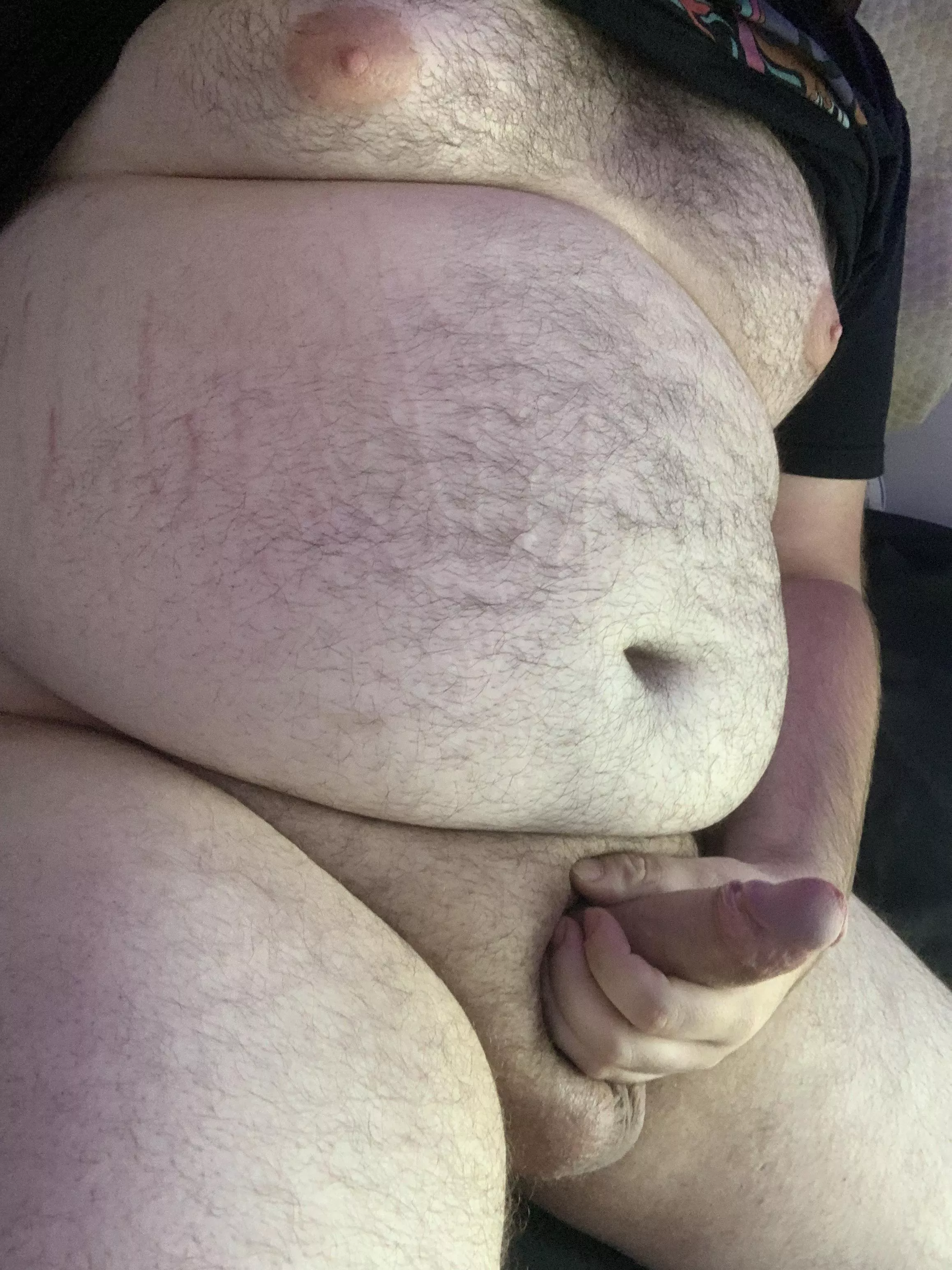 would you lay in daddy’s lap and tease his cock with your mouth?