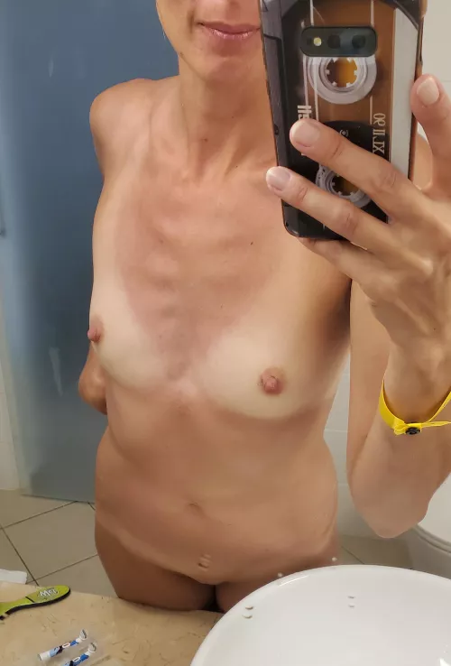 Tiny milf (f40) tits are the yummiest..