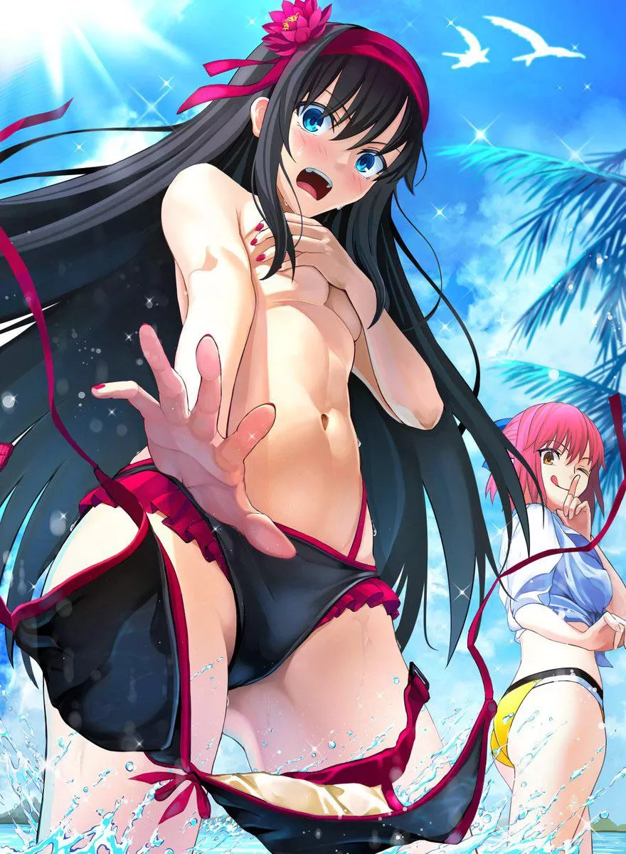 Losing her top in the waves