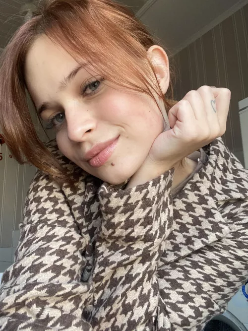 A small girl in a big blazer. Is it cute? 😅