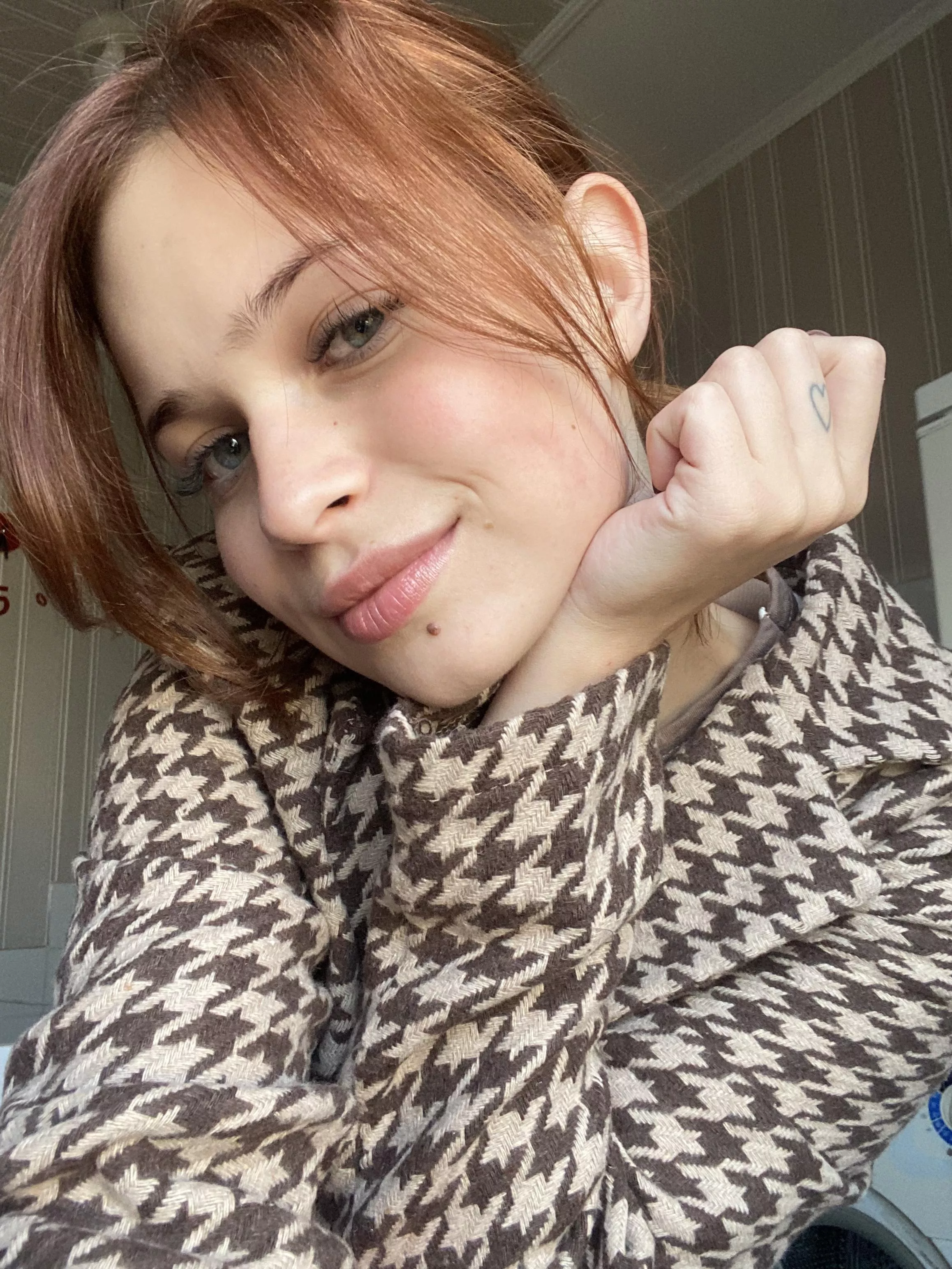 A small girl in a big blazer. Is it cute? 😅