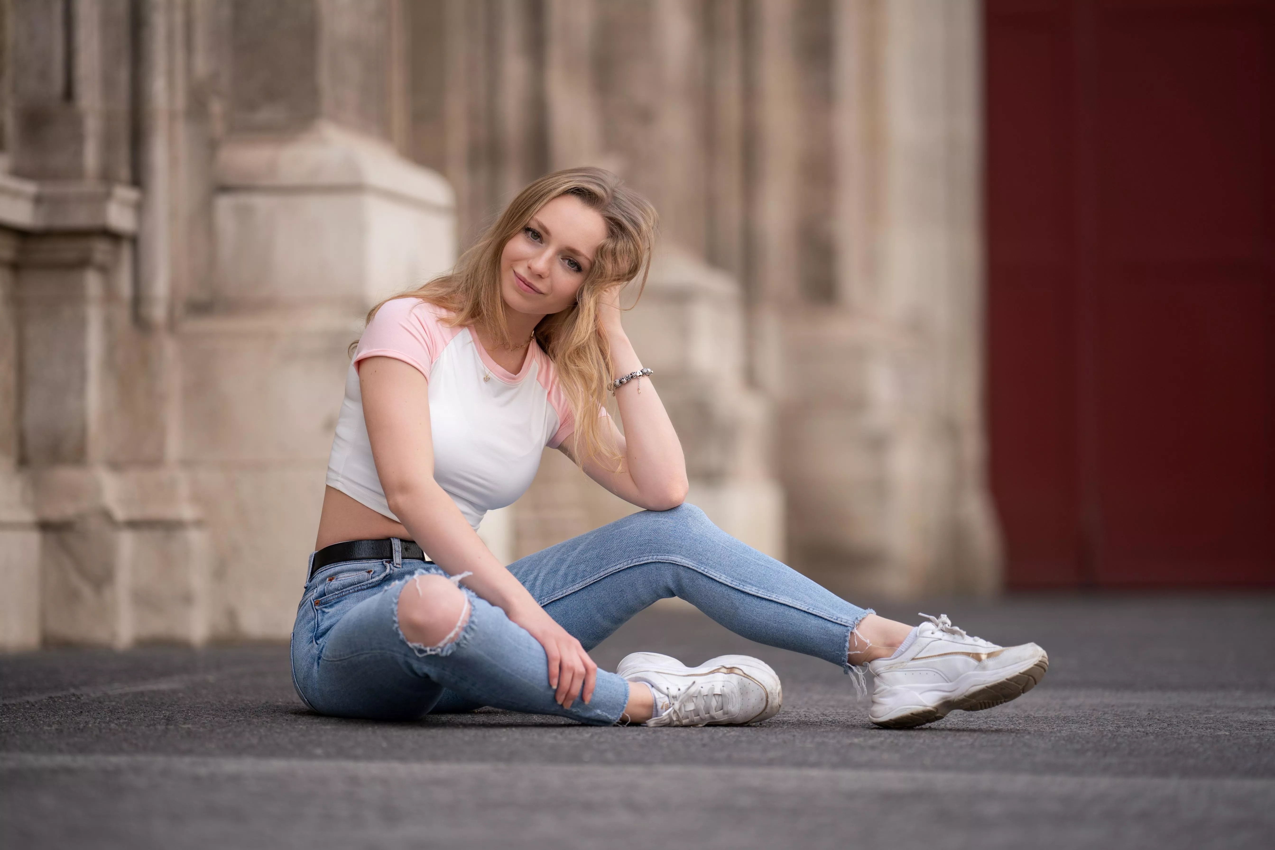 Through the tight, white crop top
