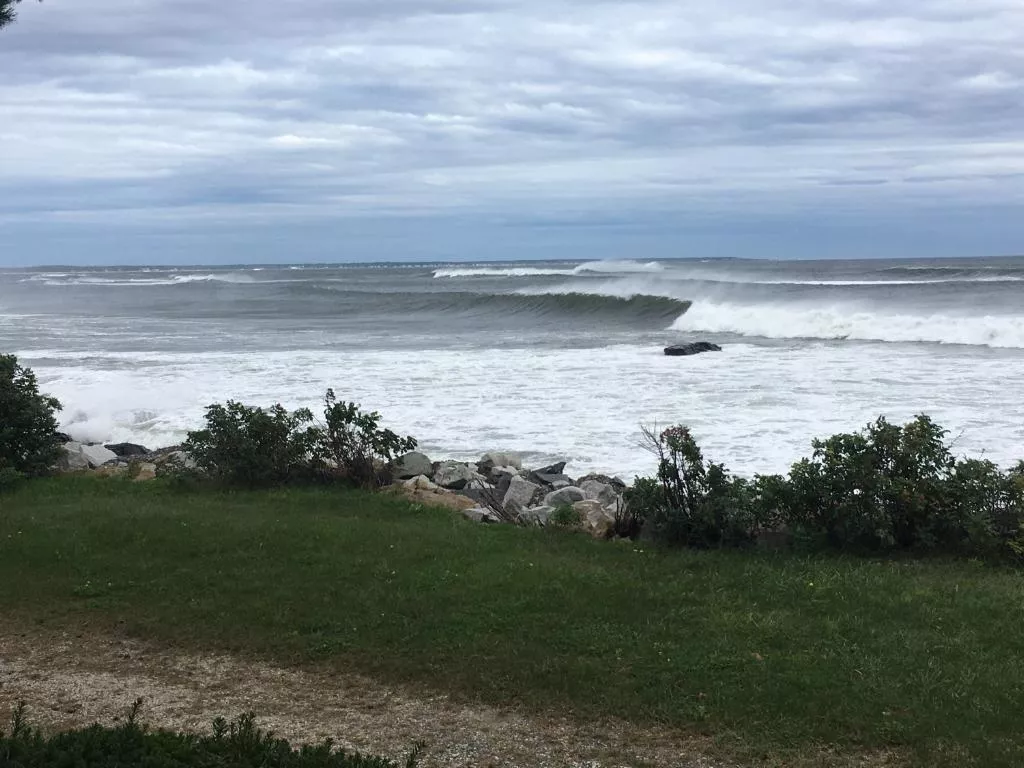 Waves from post-tropical storm Lee rolling into a southern Maine beach