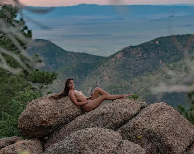 My friend took this picture of me posing naked on these rocks while our boyfriends watched us.