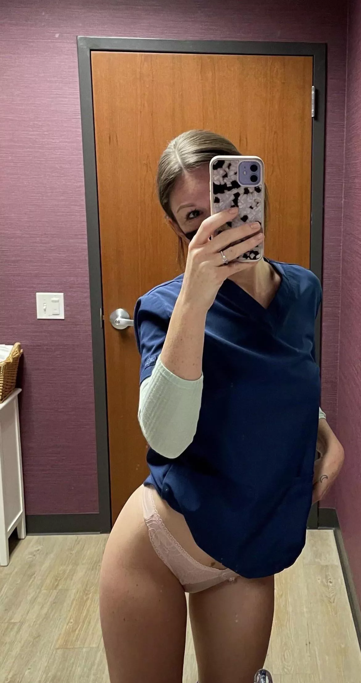 Naughty nurse at work in pink thong