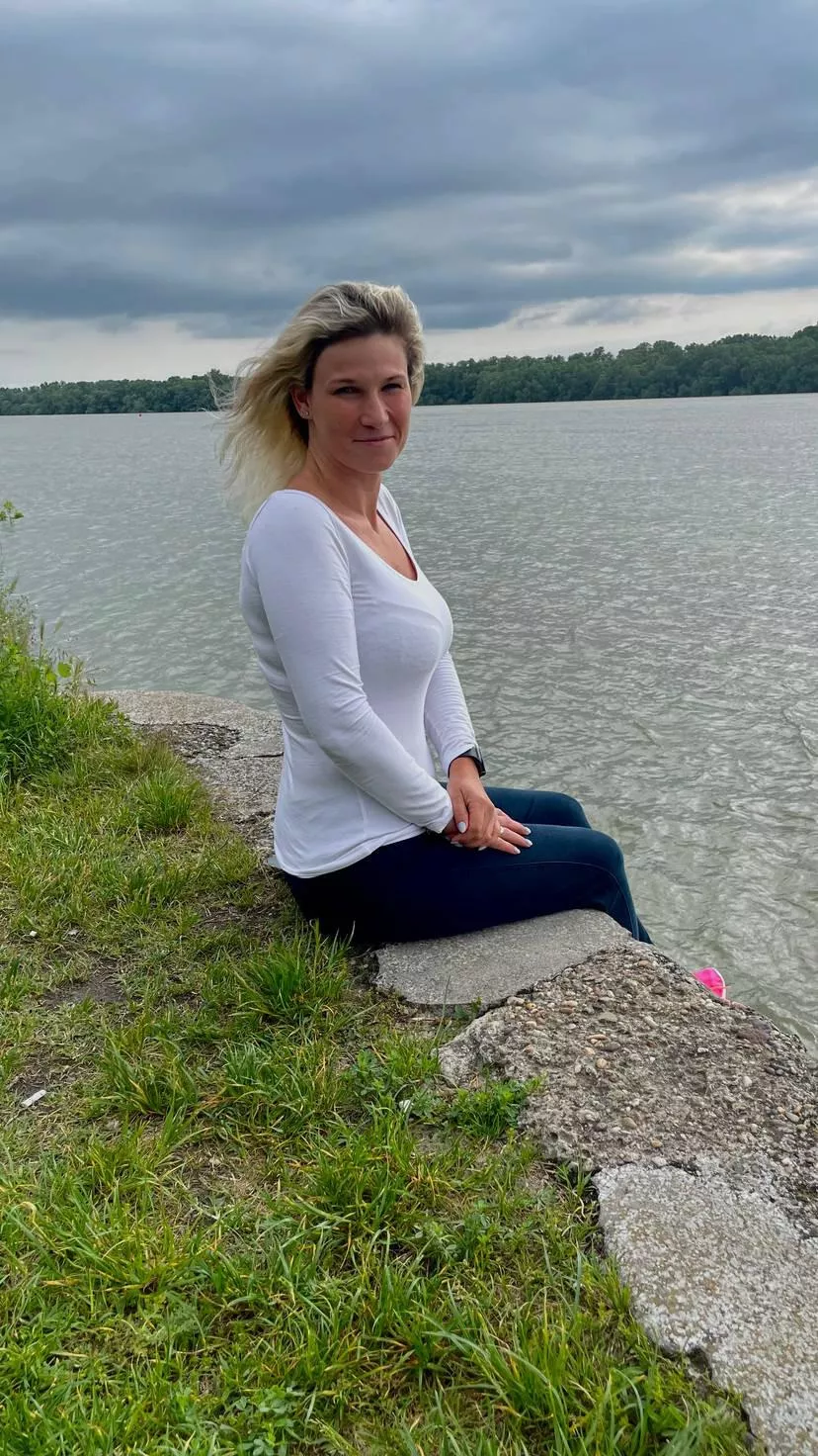 Tight white top by the water