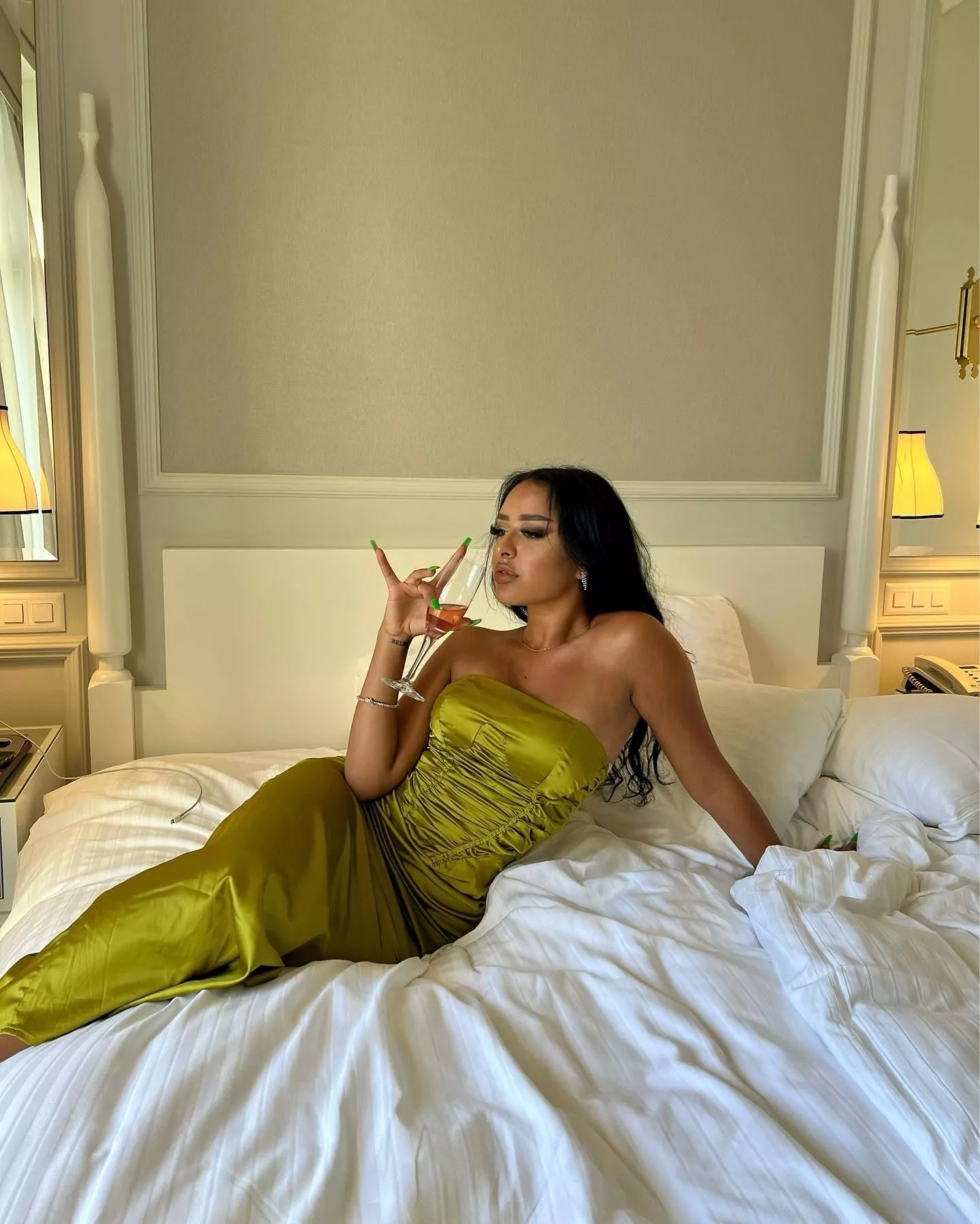 A lady with a class wearing a tight dress