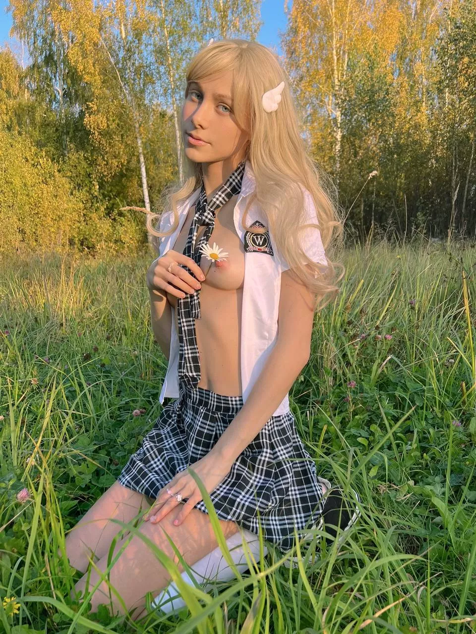 Blond slim girl with a skirt