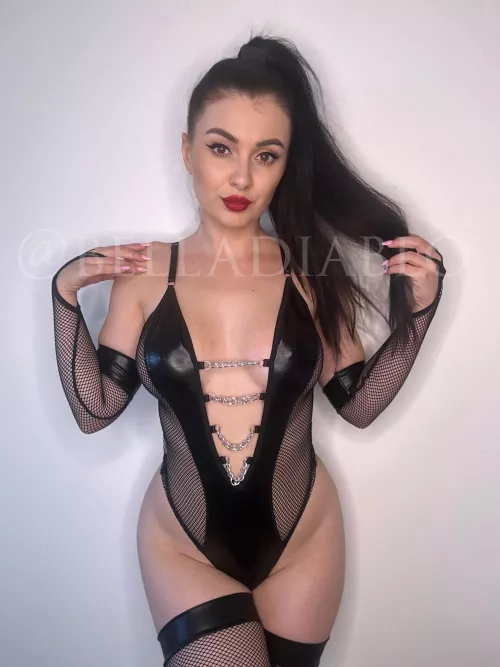 Fishnets with leather, what a combination