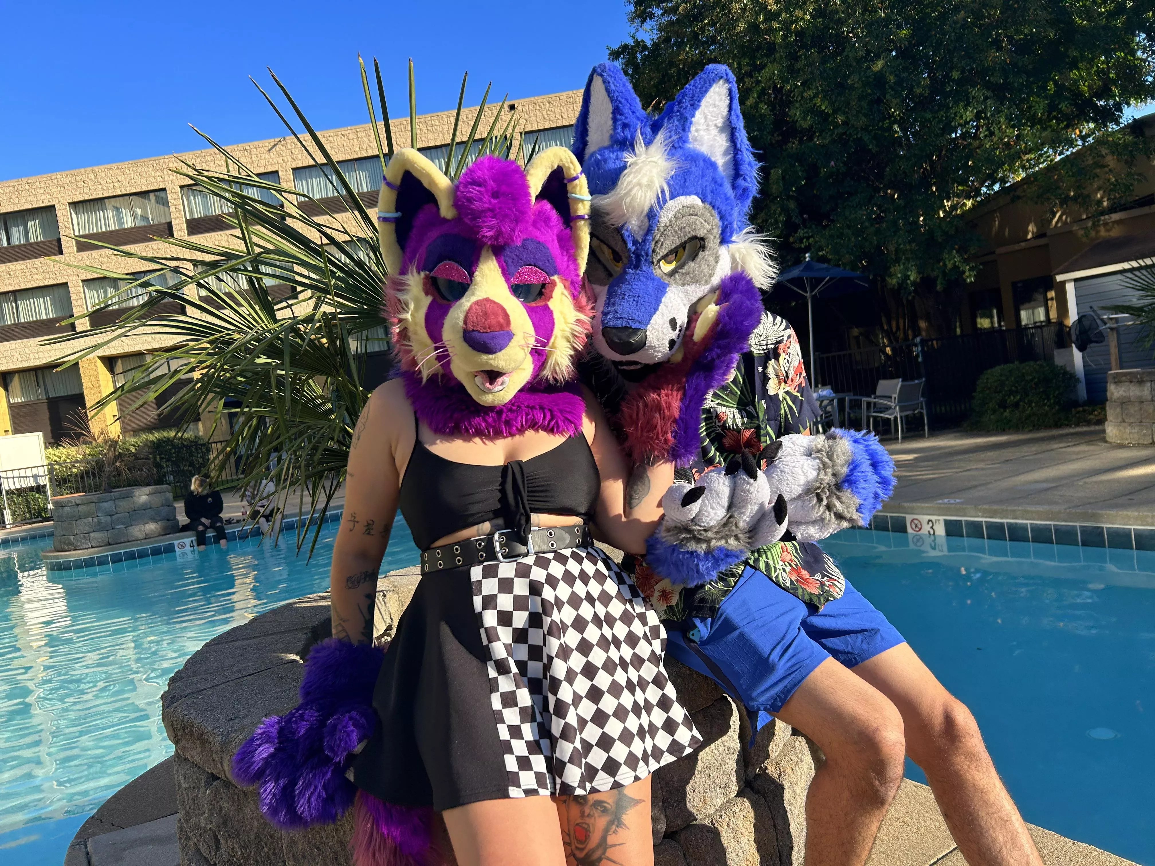 Fursuiting at the pool UwU