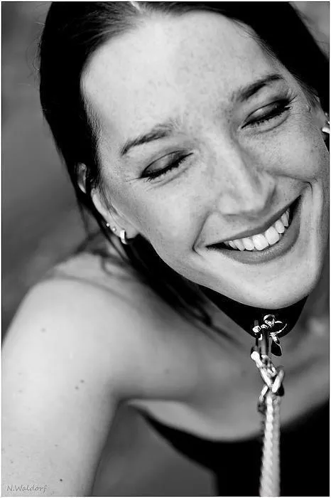 Collared, Leashed and Smiling