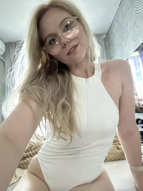 Cute blonde in white