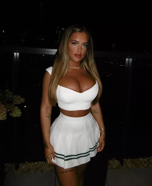 Young bimbo looking ready to play a tennis match tonight