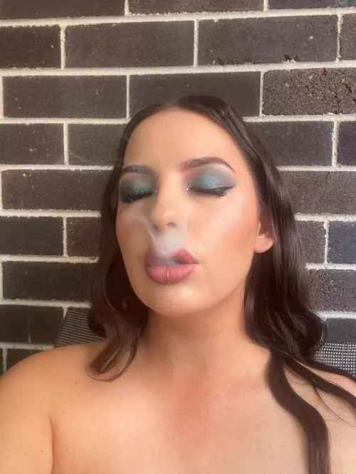 Topless smoking on my balcony. I bet you wish you were my neighbour.