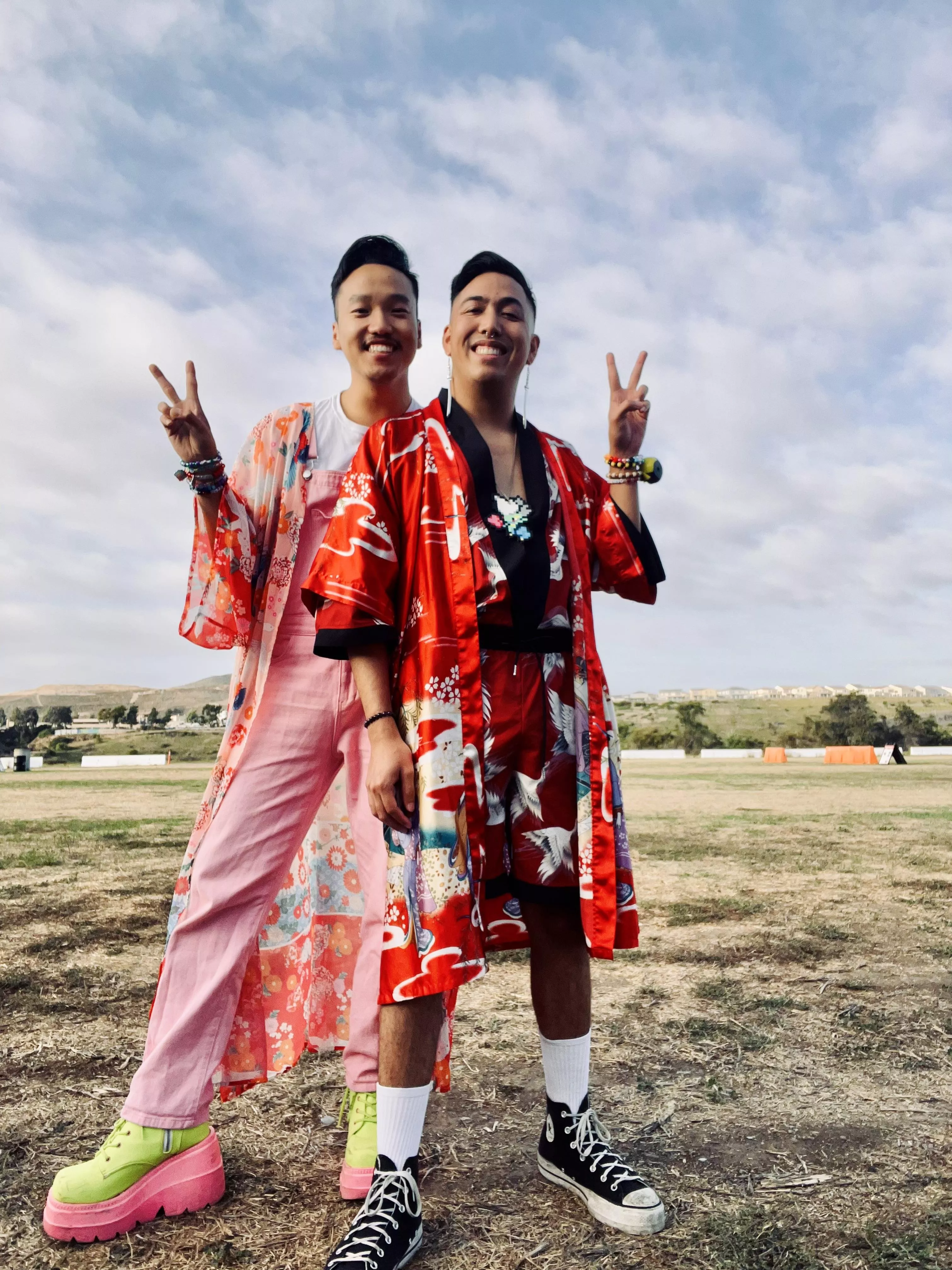 My partner (red, M26) and I (pink, M27) at our first official show/rave together since we’ve been partners for 3 months now. Odesza in San Diego 🕺🏼
