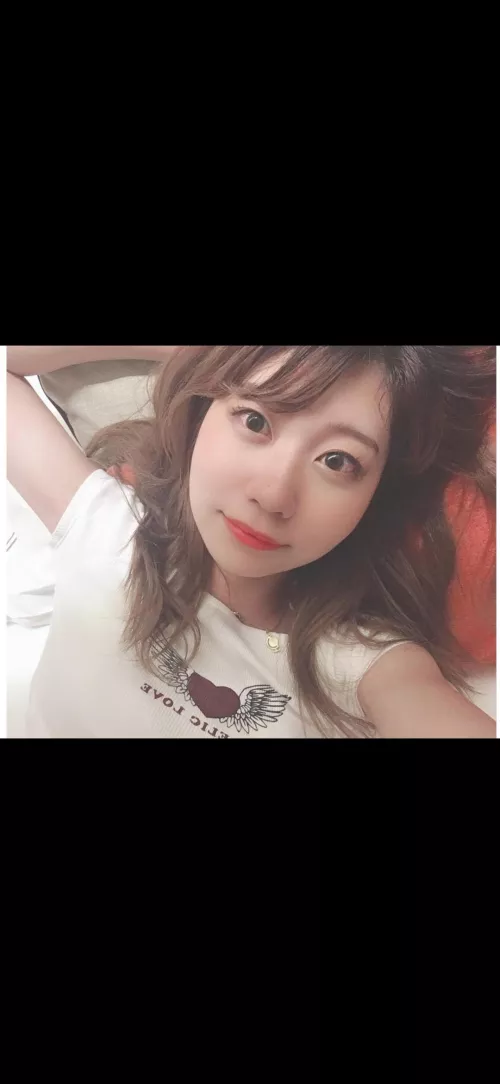 Cute Japanese girl in bed