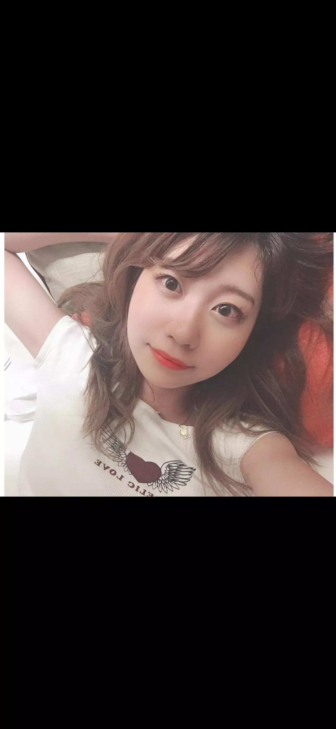 Cute Japanese girl in bed