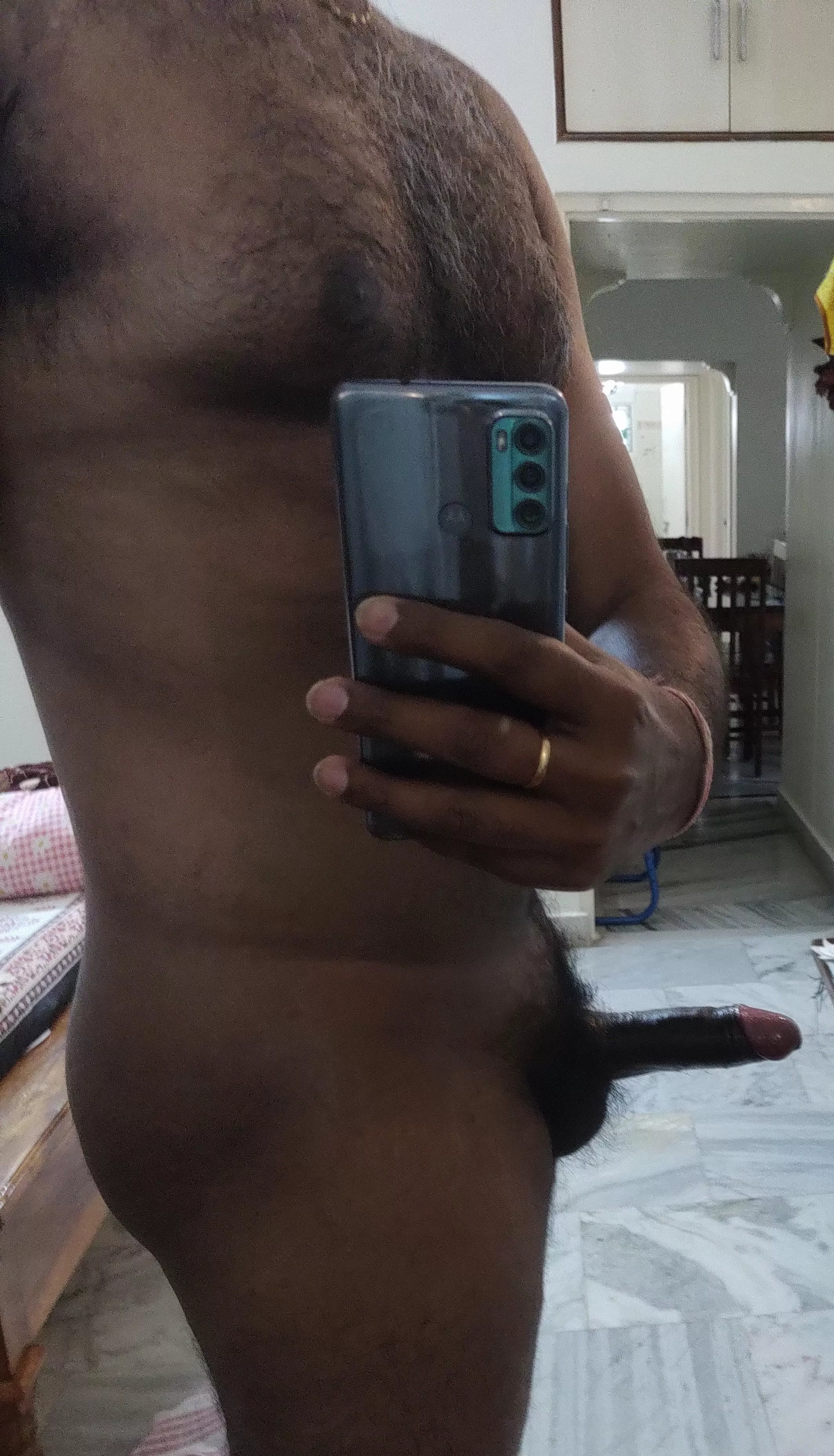 Hairy chest and oiled up shaft ready to get milked