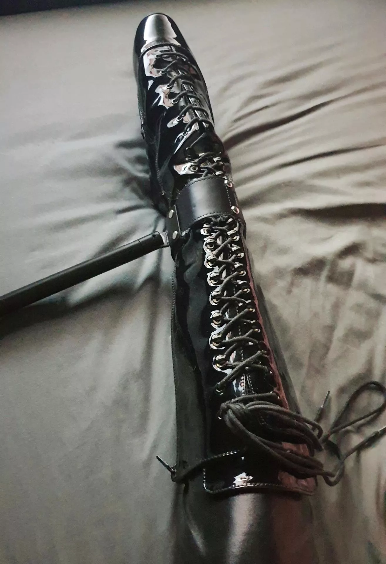 My shiny ballet boots look so much sexier when locked in restraints