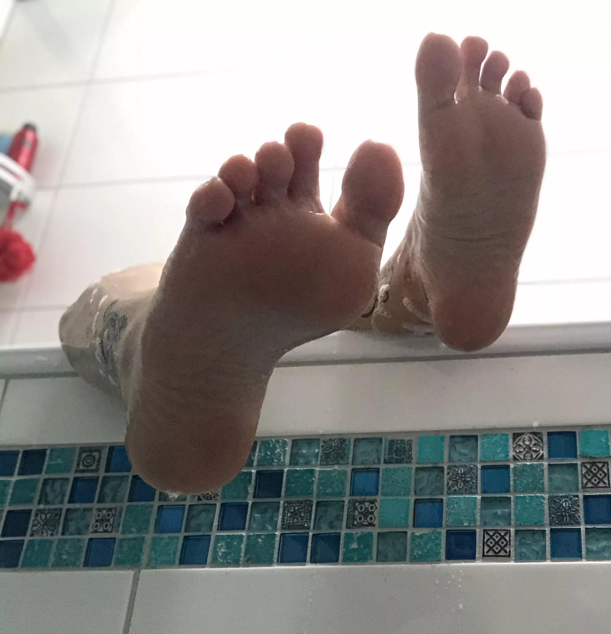 Wait until I'm done and then lick the bath water from my feet!