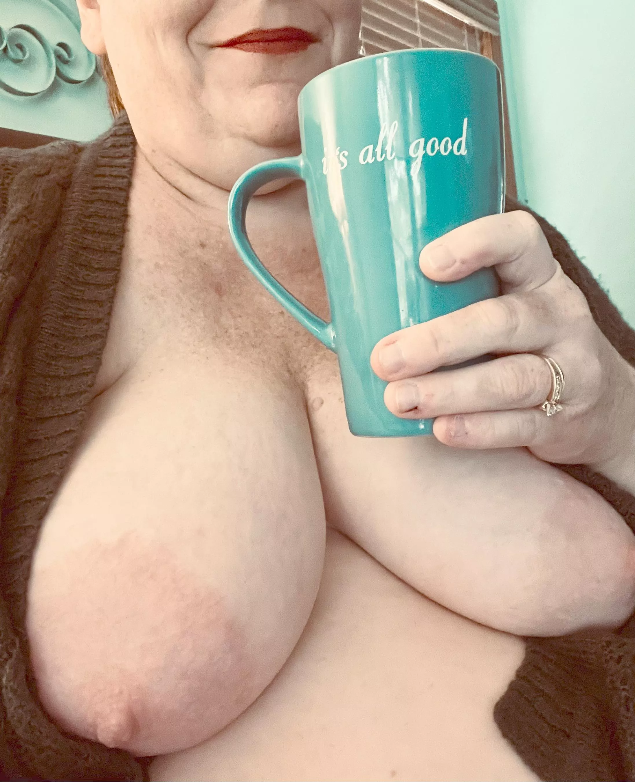Just a suburban married MILF getting on the boobs/cardigan/coffee train.