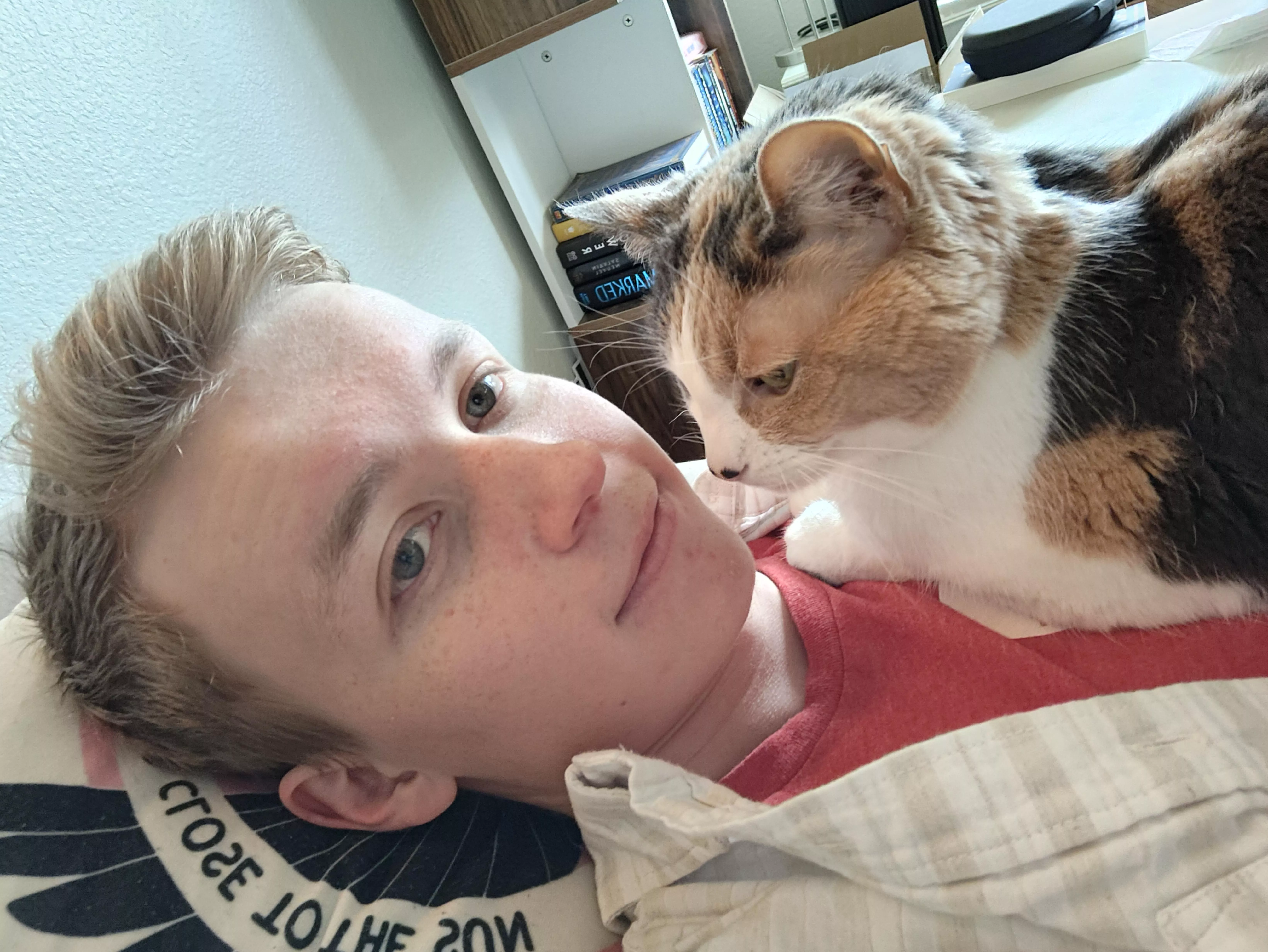 Obligatory cat pic because this is how I usually am at home