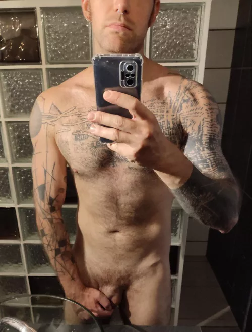 That shower is kind of ugly but it can easily fit two people in...