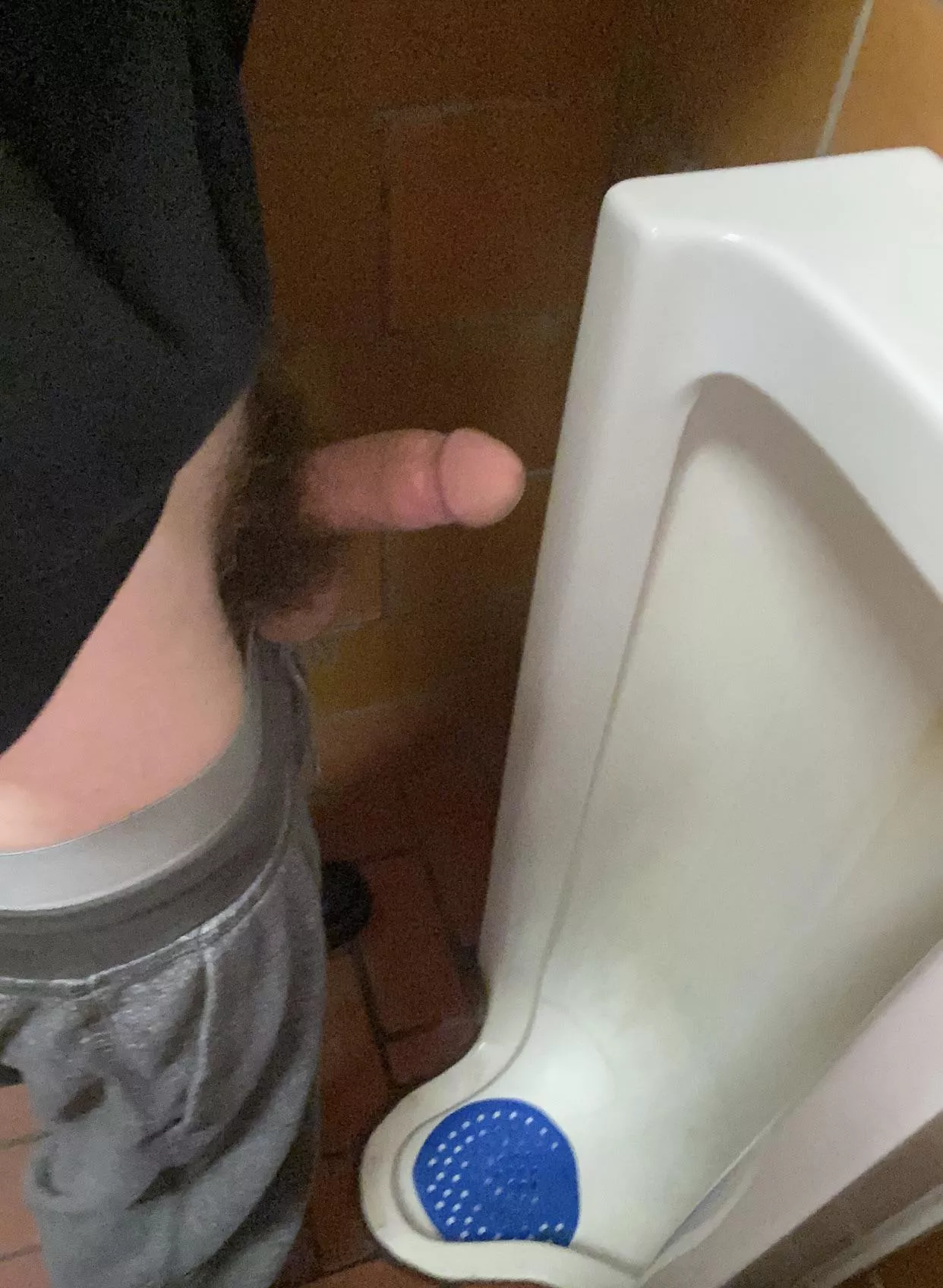 hairy dude at the urinal