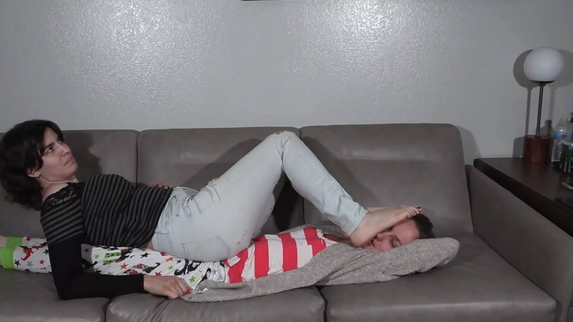 Summer's big feet enjoying a human footrest