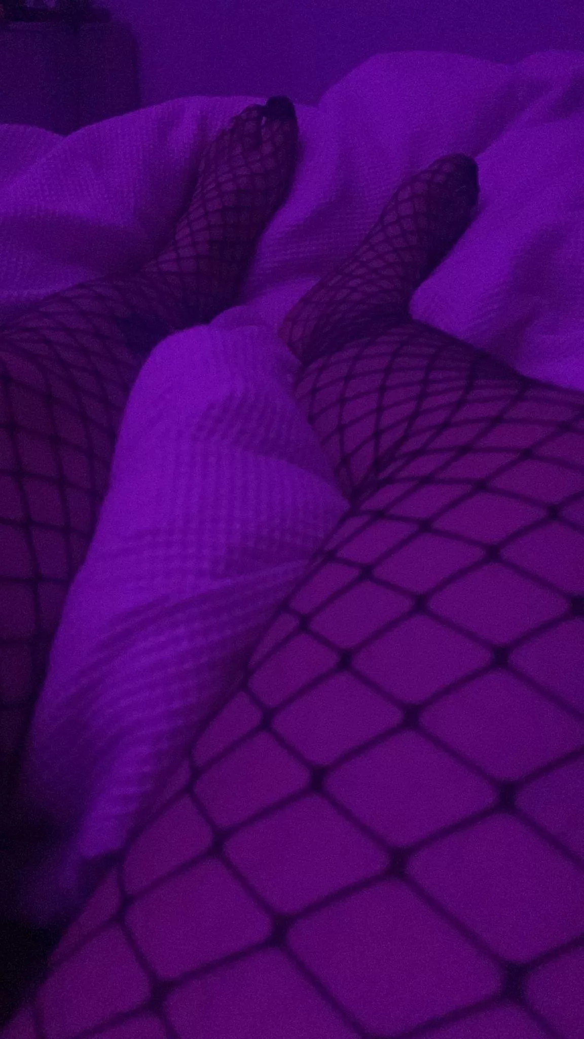 My feet in fishnets. There is also another of these showcasing my cock too
