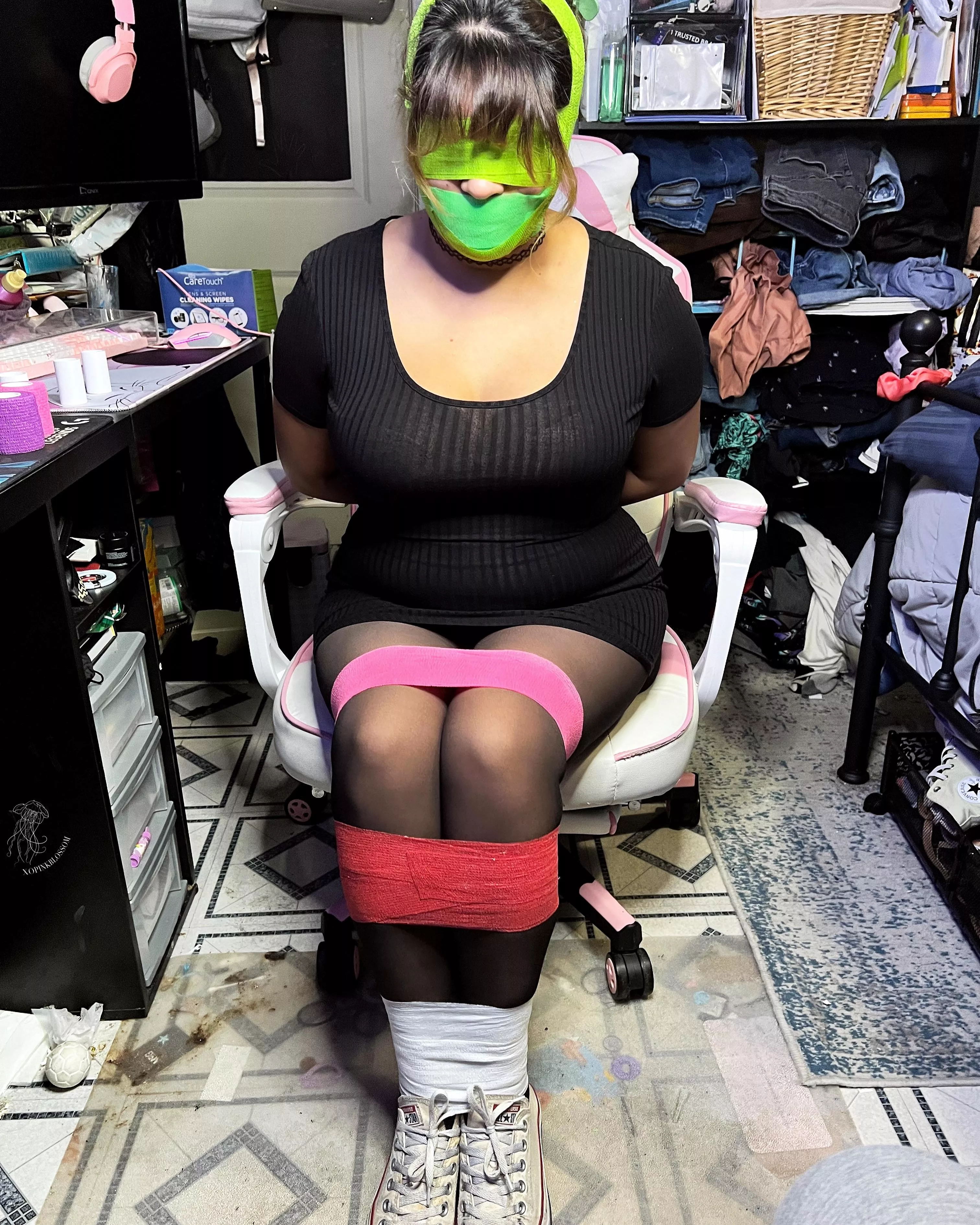 Wrapped up, gagged and blindfolded