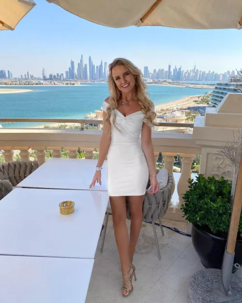 Divine in white dress