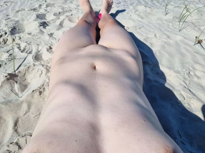Taking in the sun nude on the beach ;)