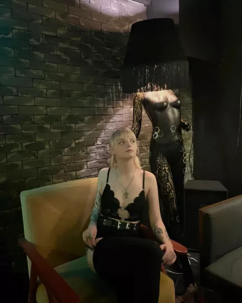 Why does she have a chandelier on her head?