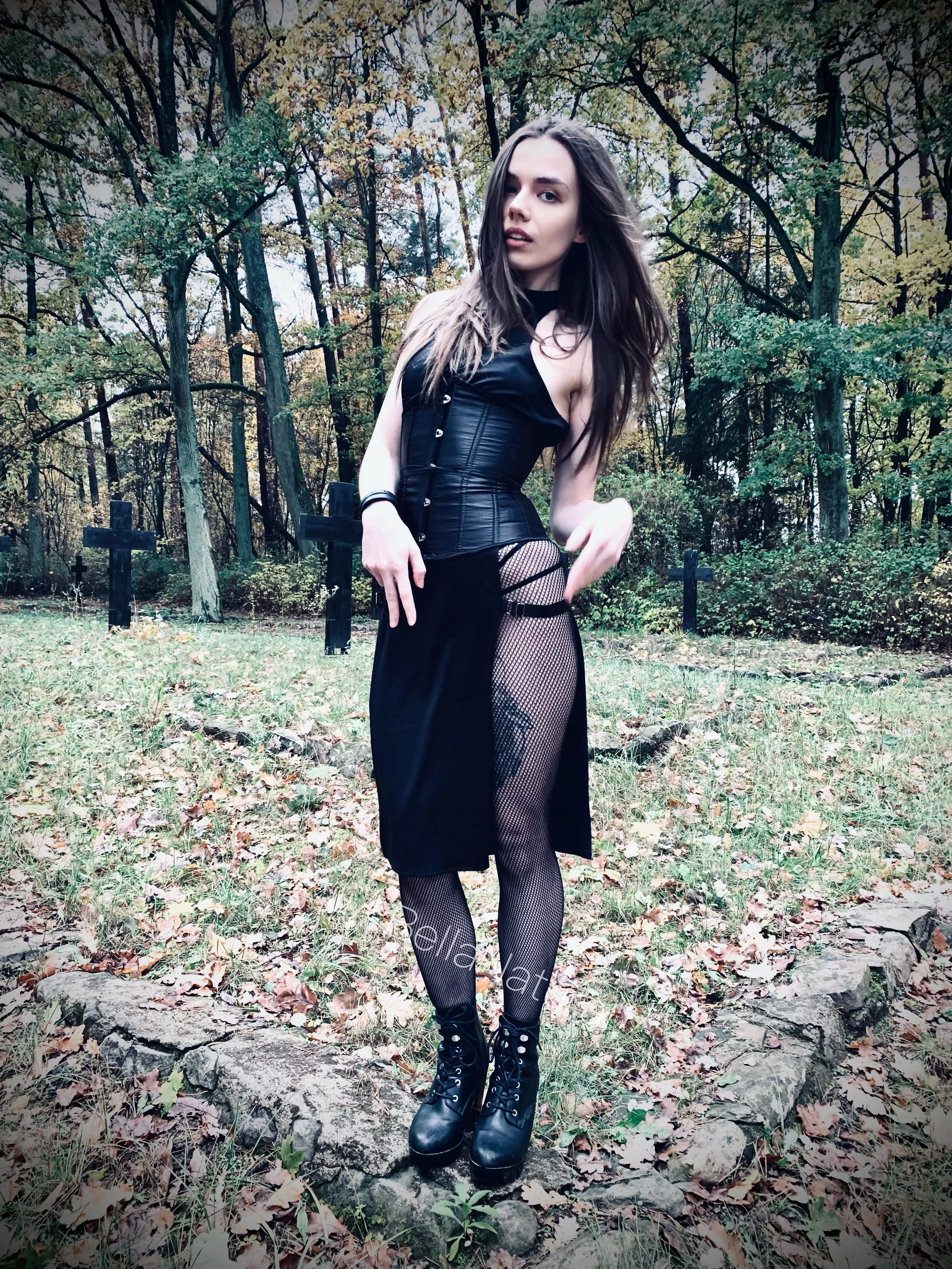 Dark haired beauty in eerie location