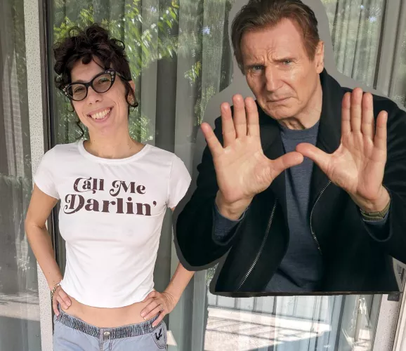 Liam Neeson lining up the perfect picture