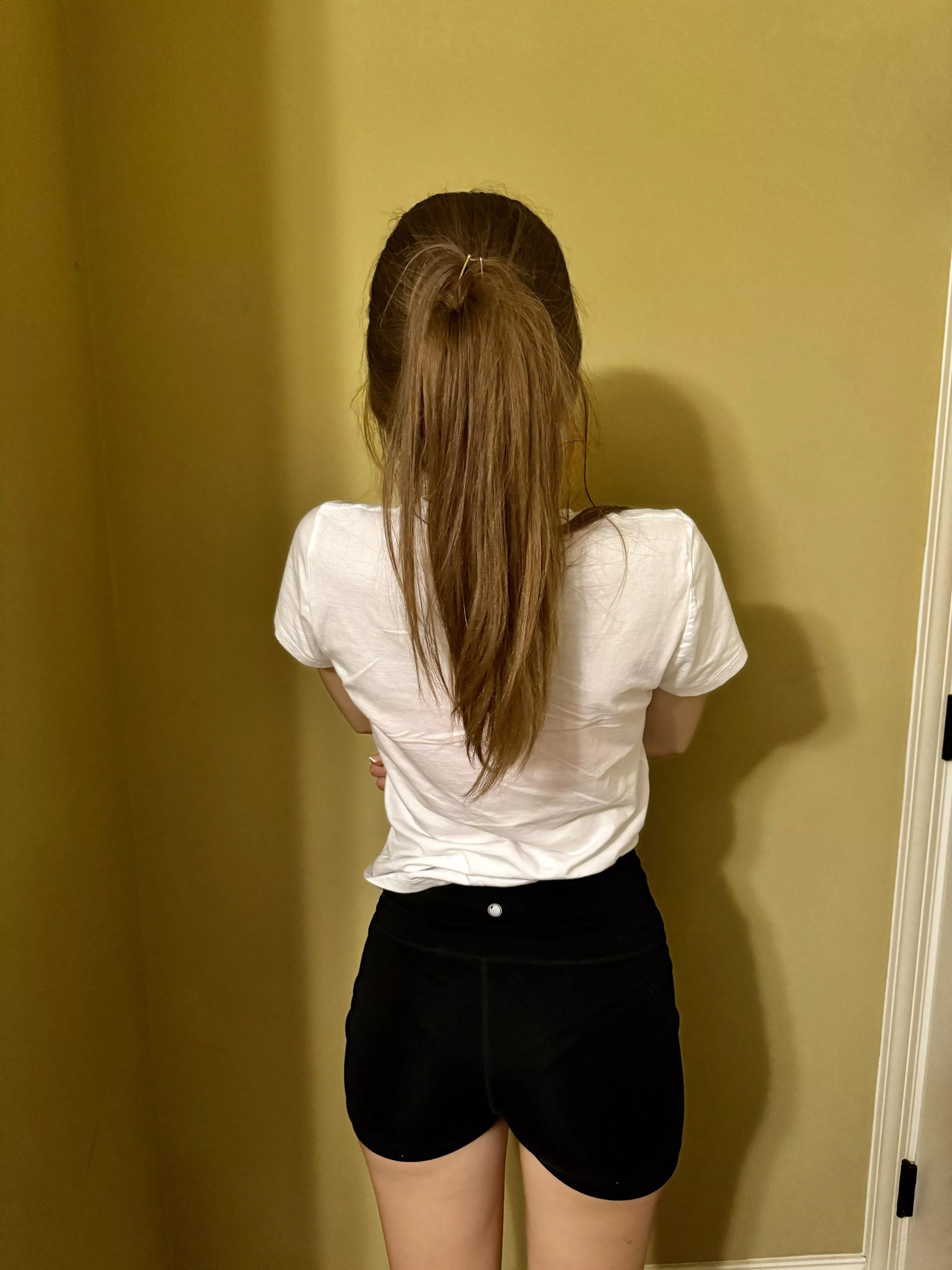 How long do you think my hair is? Bellow tshirt? Bellow butt?
