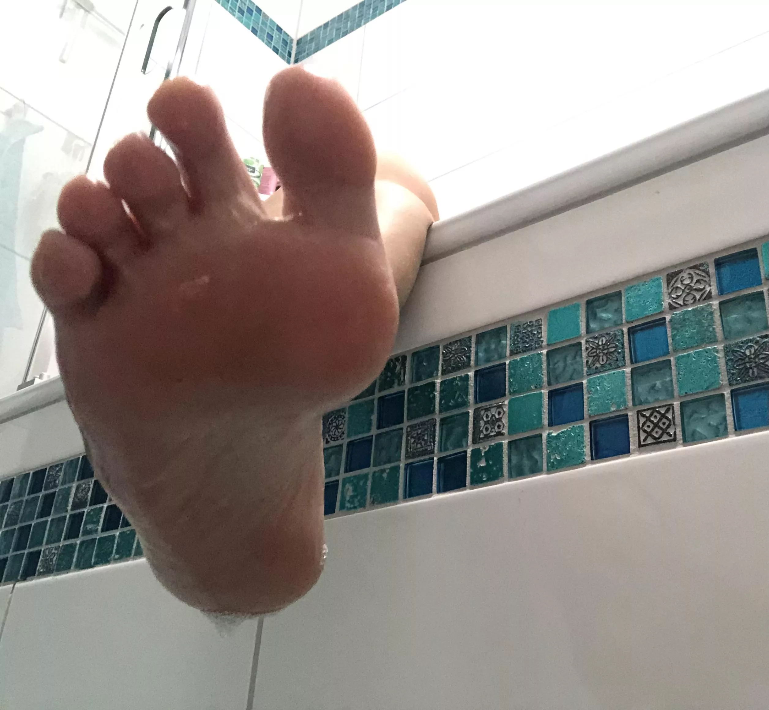 I press my wet foot in your face to dry it off a bit.
