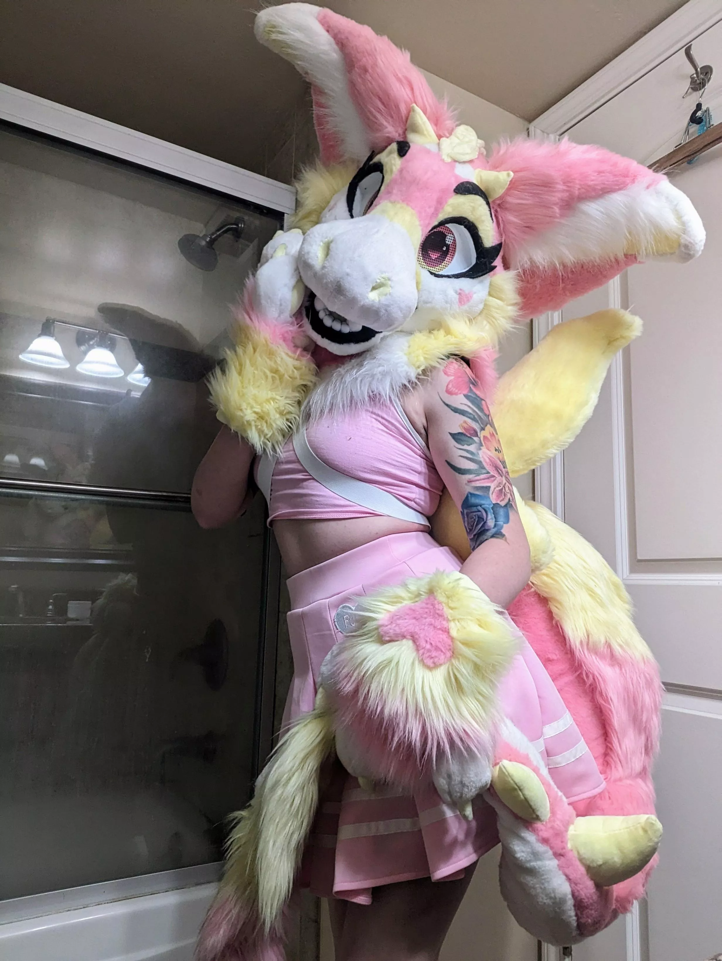 I went to my first ever con wearing my new sona, Sylvie! She's a fairy dragon!