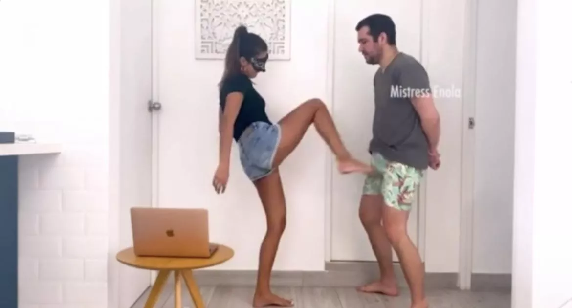 Is she kicking his balls or dick?