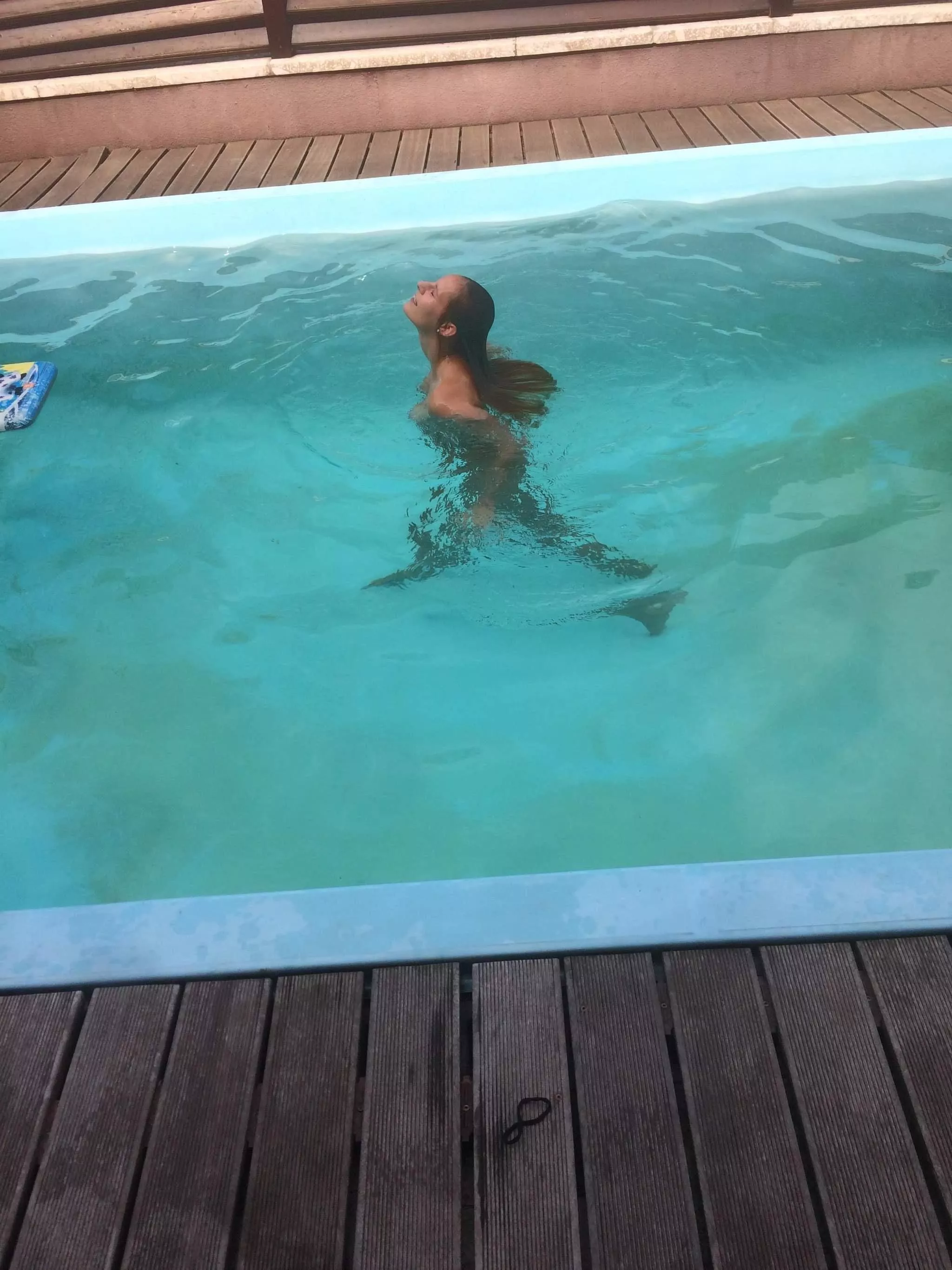 In the pool at home