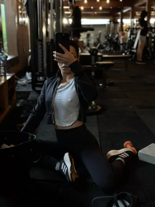 Post-training, beneath the damp sports tee, your athletic form becomes a captivating masterpiece